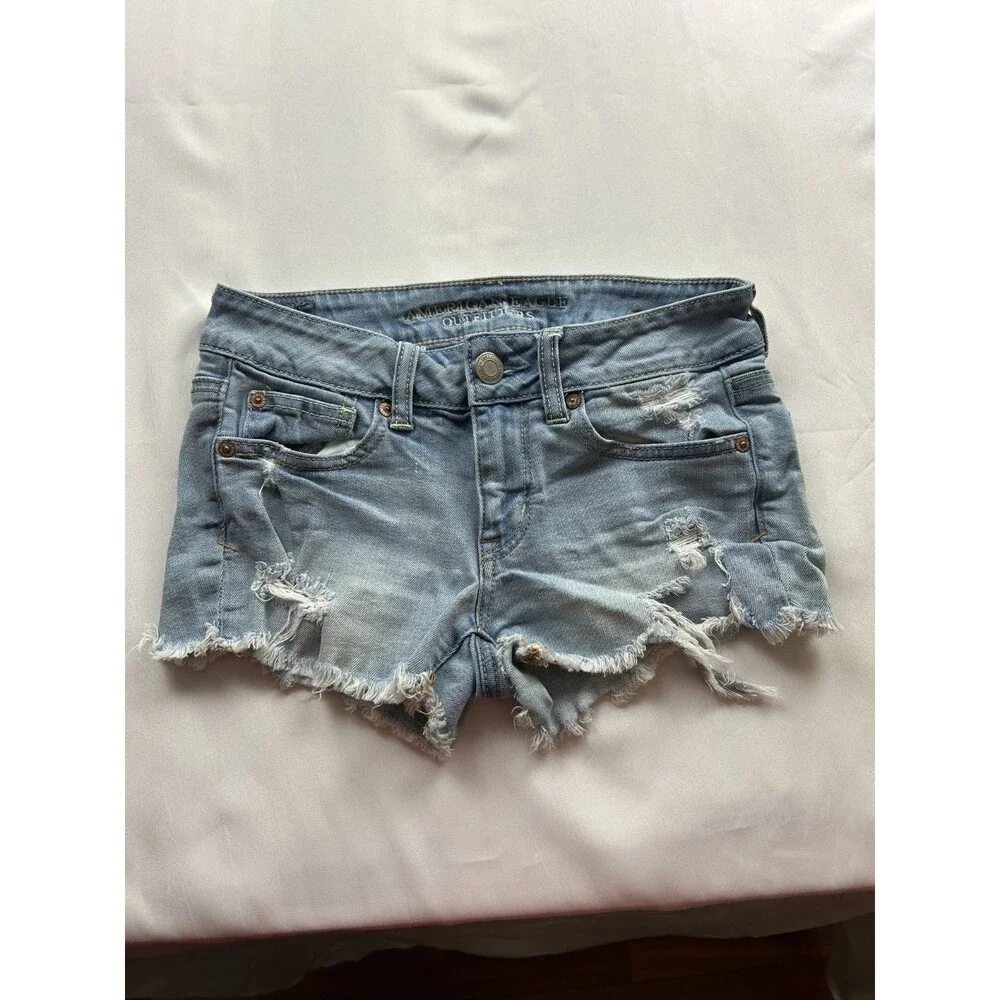 American Eagle Women's Denim Cut Off Raw Hem Denim Jean Shorts sz 2 - Picture 1 of 6